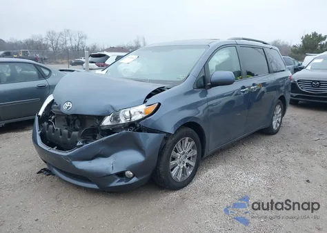 2015 Toyota Sienna Xle 7 Passenger z USA, uszkodzony, nr VIN 5TDDK3DC8FS102654